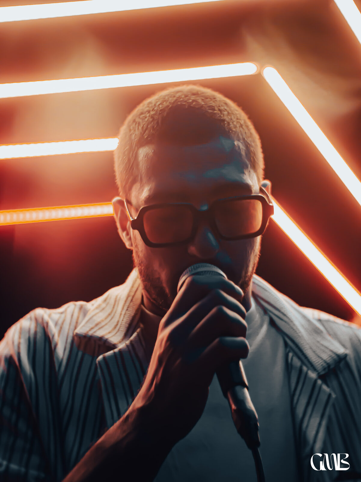 Event, singer under neon light