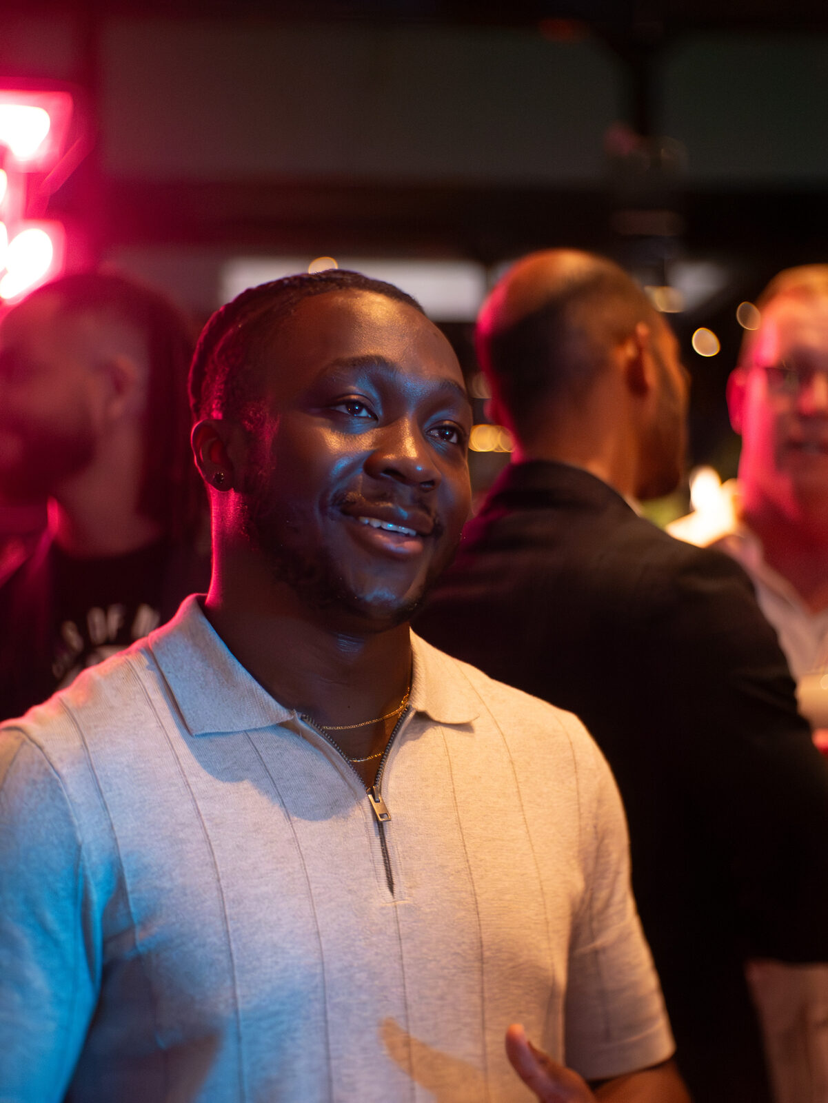 Event, guest portrait under neon