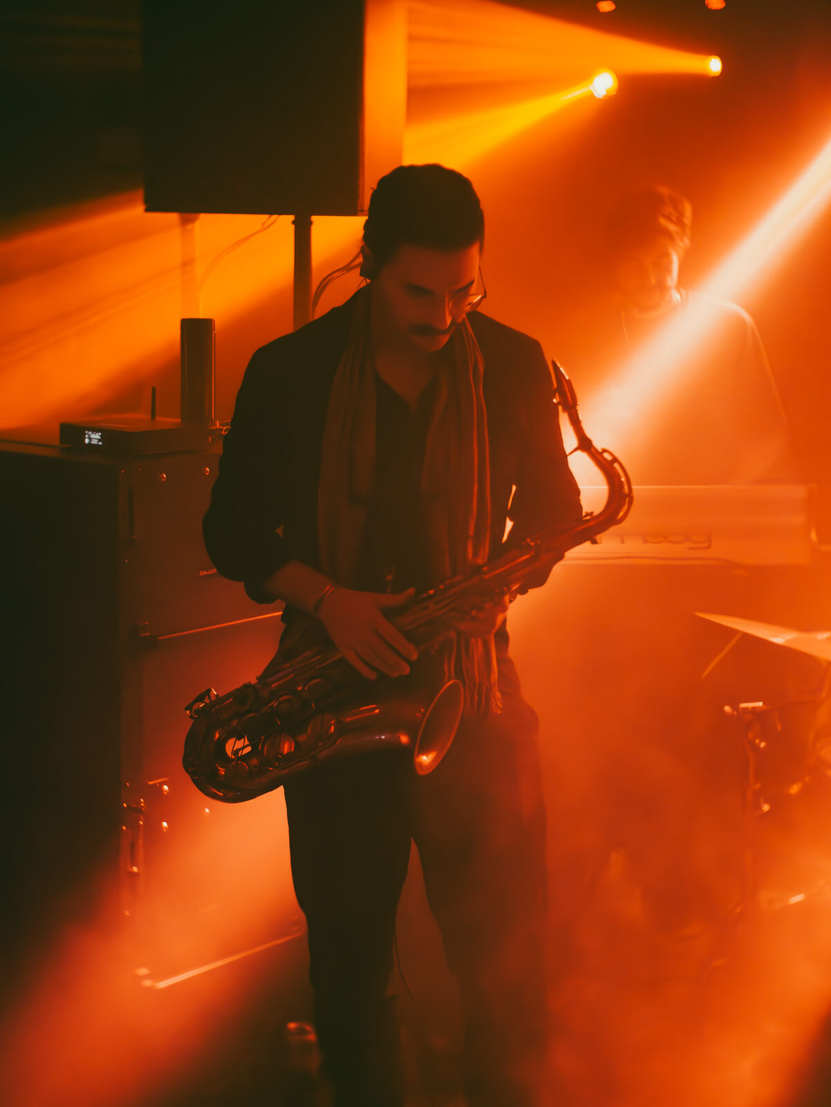 Event, saxophonist wide shot
