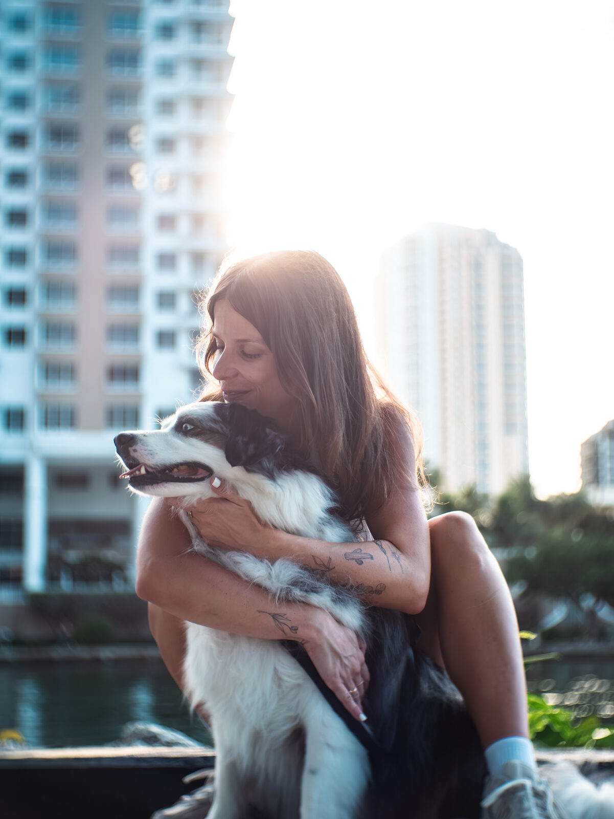 Woman and dog, Miami waterfront
