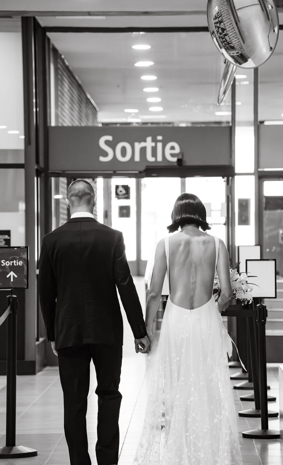 Wedding, black and white exit